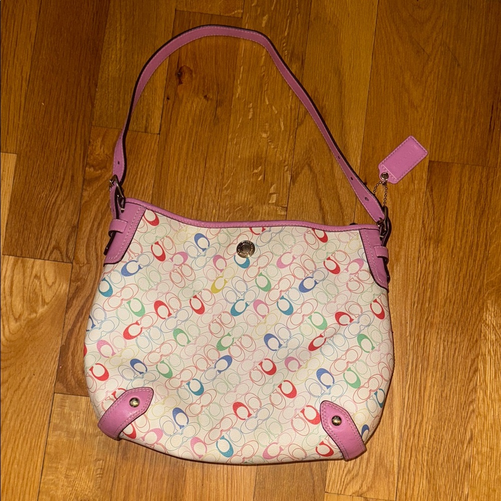 Coach heritage Chelsea pink trim multicolor signature bag.